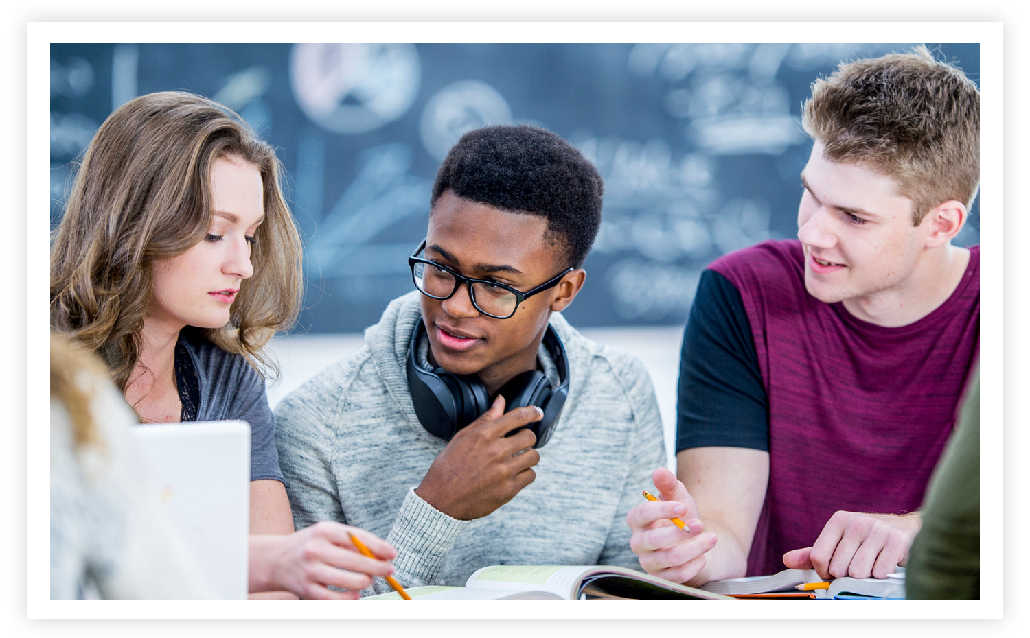 stock image of students working together